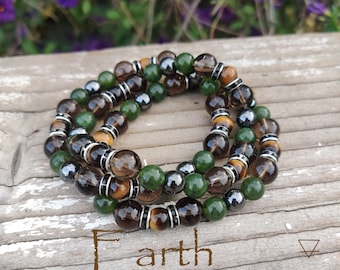 GORGEOUS Smokey Quartz, Hematite, African Jade, resembling Earth tones . A GORGEOUS bracelet.