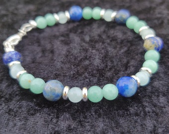 Lapis. Aquamarine. Green Adventurine. Lessen anxiety, Leads to inner truths, and increases love and prosperity Promotes safe Travels.