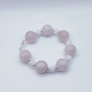 18mm Rose Quartz. 8mm Rainbow Moonstone. surprisingly light weight, Big Heart felt.