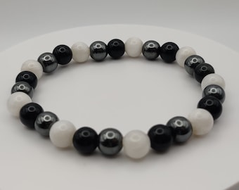 Enlightened Moonstone , Grounding Tourmaline, and  Forgiving Hematite, Gorgeous Bracelet.