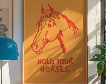 May include: A red and white illustration of a horse's head on a yellow background with the text "Hold Your Horses."
