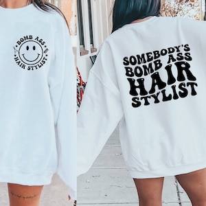 Somebodys Bomb Ass Hairstylist Sweatshirt, Hair Stylist Crewneck, Cosmetologist Sweatshirt, Words On Back Crewneck, Hairstylist Sweatshirt