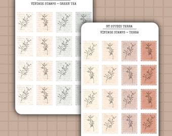 May include: Two sheets of vintage style stickers with a floral design. The stickers are in a square shape with a white background and a light brown, light grey, or light orange border. The text "BY STUDIO TERRA" and "VINTAGE STAMPS" is printed on the top of each sheet. The text "GREEN TEA" is printed on the top of the left sheet. The text "TERRA" is printed on the top of the right sheet.
