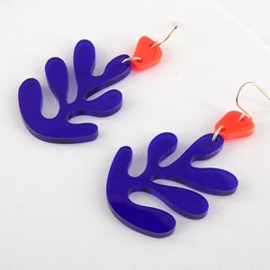 Henri Matisse-inspired transparent blue and orange acrylic dangle earrings. Handmade statement earrings.