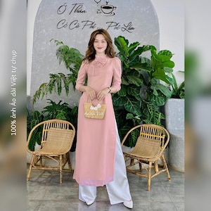 Pre-made Ao Dai Viet Nam - Modern Ao Dai - Áo dài cách tân nữ 4 tà tay phồng tiểu thư màu hồng ruốc may sẵn đính nơ xinh đẹp