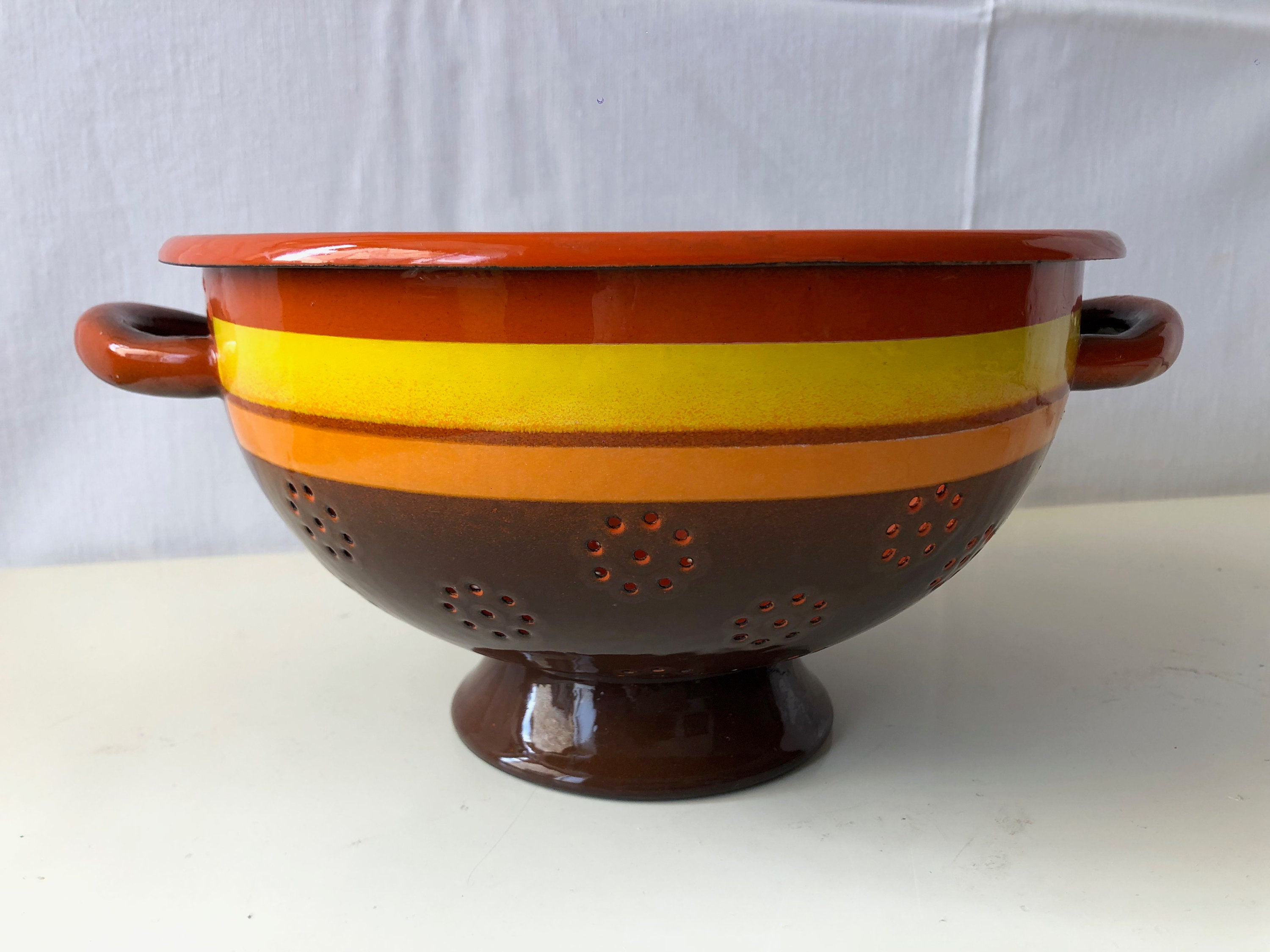 Vintage enameled iron colander from the 1970s