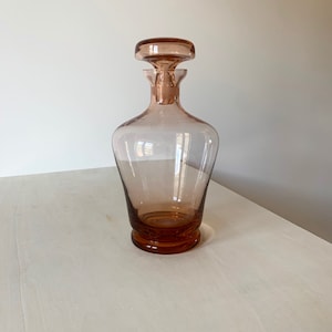 Blown glass bottle with antique pink Murano vintage cap made in Italy from the 1960s