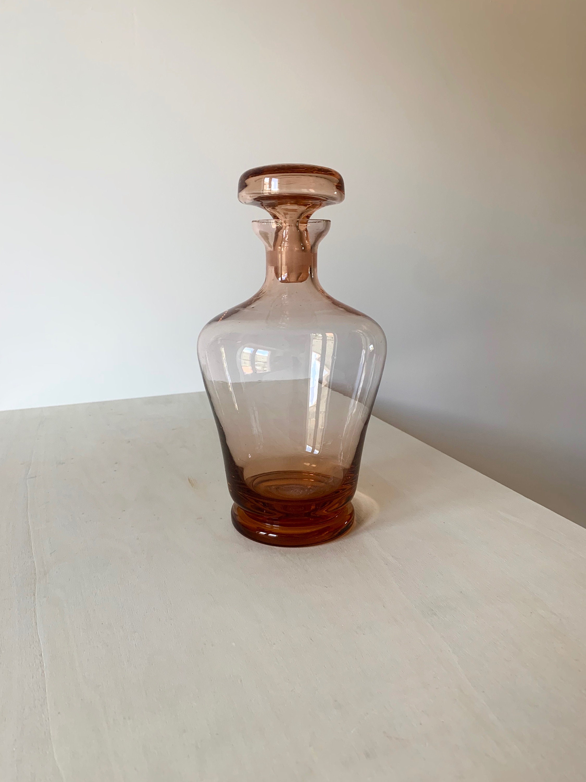Blown glass bottle with antique pink Murano vintage cap made in Italy from the 1960s