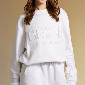 Embroidered Bride Sweatshirt. Can be personalized on the cuff and chest with Premium Embroidery. Gift For Bride