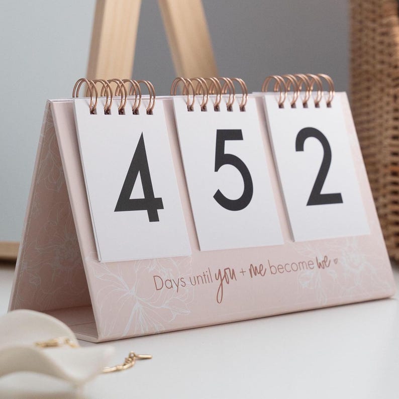 Wedding Countdown Calendar is a great way to countdown the days to your special day. Available in pink color. Includes 15 cards in total: countdown cards 0-9 and 5 inspirational quotes.