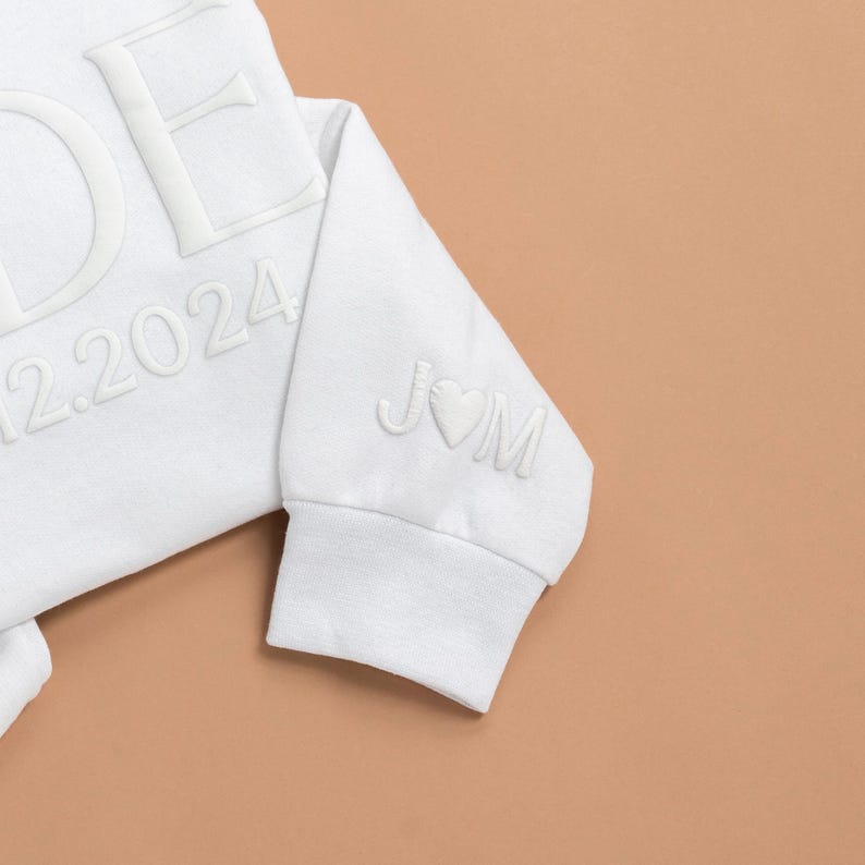 Initials and heart on the sleeve