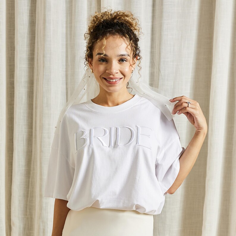 Embroidered BRIDE T-shirt with the roomy, boxy fit and embroidered design. Gift For Bride