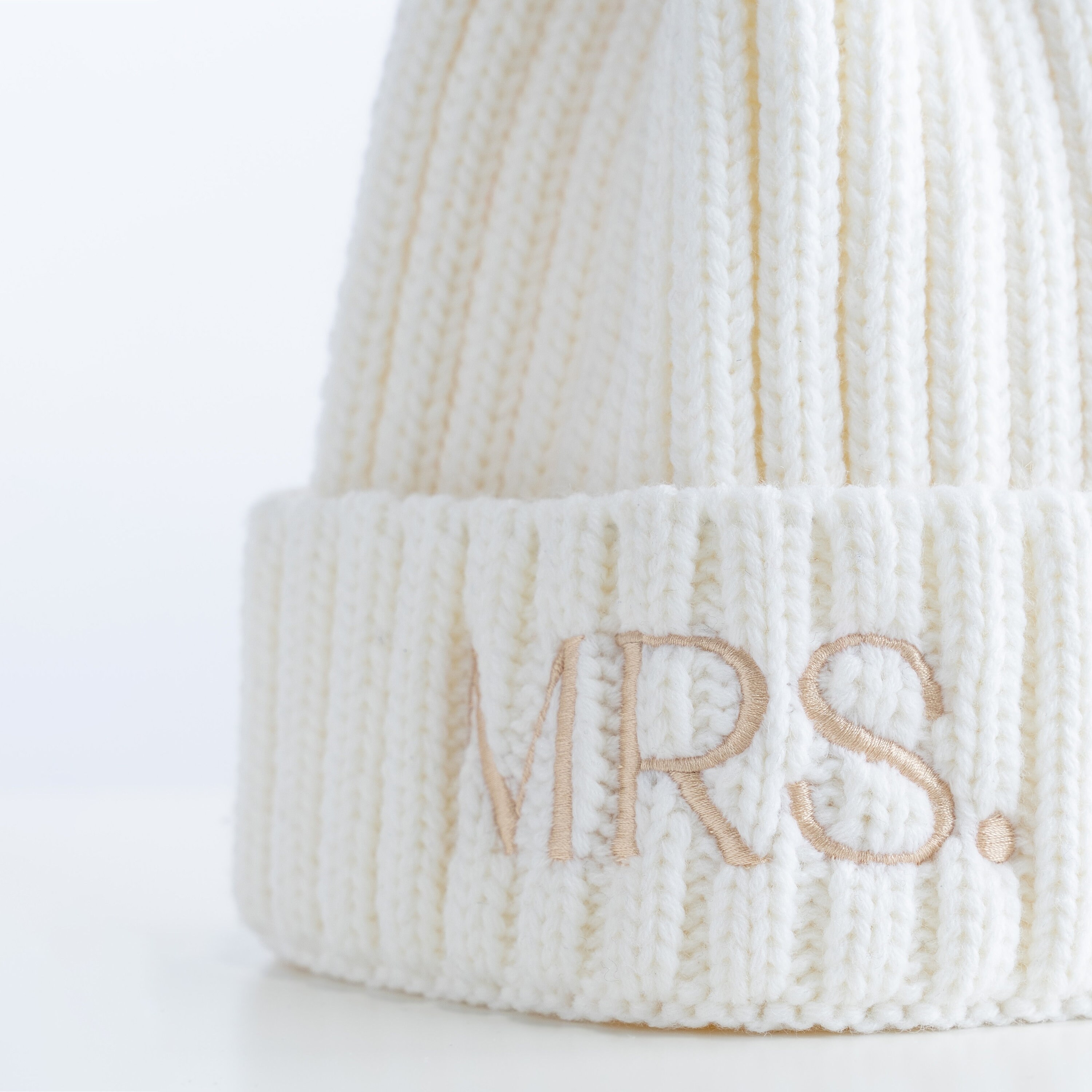 White Knitted Hat with Lapel and Decorative Emblem Logo Knot Beanie | babycottons main image 2