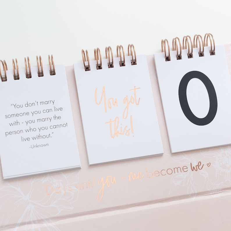 Wedding Countdown Calendar is a great way to countdown the days to your special day. Available in pink color. Includes 15 cards in total: countdown cards 0-9 and 5 inspirational quotes.