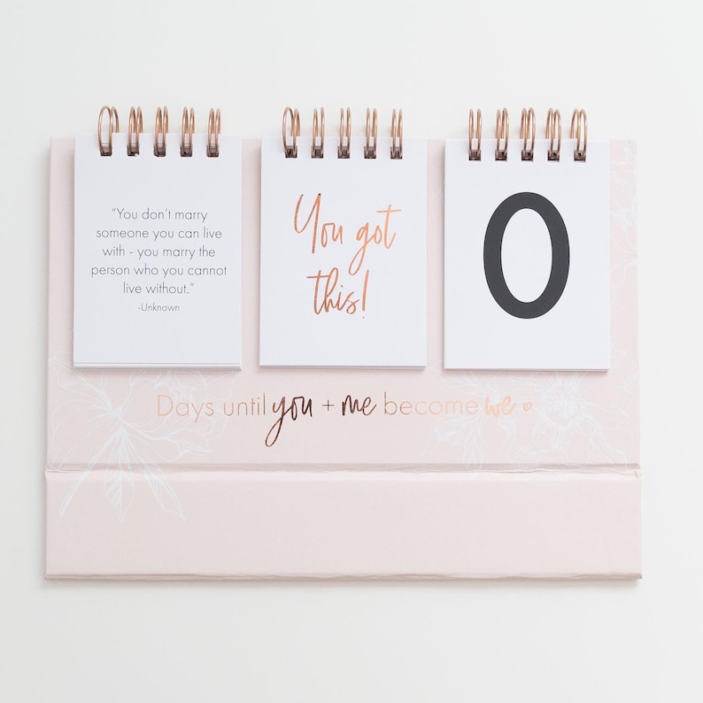 Wedding Countdown Calendar is a great way to countdown the days to your special day. Available in pink color. Includes 15 cards in total: countdown cards 0-9 and 5 inspirational quotes.