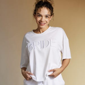 Embroidered BRIDE T-shirt with the roomy, boxy fit and embroidered design. Gift For Bride