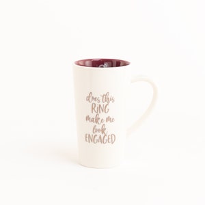Ceramic mug with rose-gold print Does This Ring Make Me Look Engaged. Perfect engagement gift.
