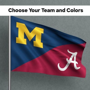 May include: A blue and red flag with a white "A" and a yellow "M" on it. The flag is waving in the wind. Choose Your Team and Colors.