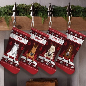 May include: Four red and white Christmas stockings with a horse design and the names Lisa, David, Emily, and Tom.