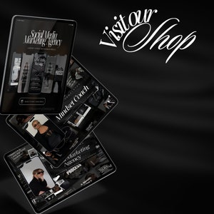 May include: A collection of black tablets and phones displaying social media marketing content. The text "Social Media Marketing Agency" and "Mindset Coach" are visible. The phrase "Visit our Shop" is written in white script.