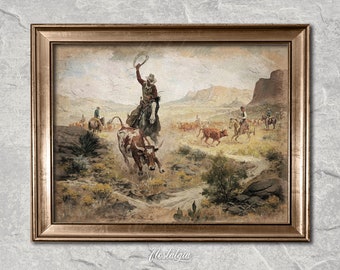 May include: A vintage watercolor painting depicting a cowboy on horseback lassoing a steer in a dusty, open landscape. Other cowboys are visible in the background, riding horses and herding cattle. The painting is framed in a gold-colored frame.