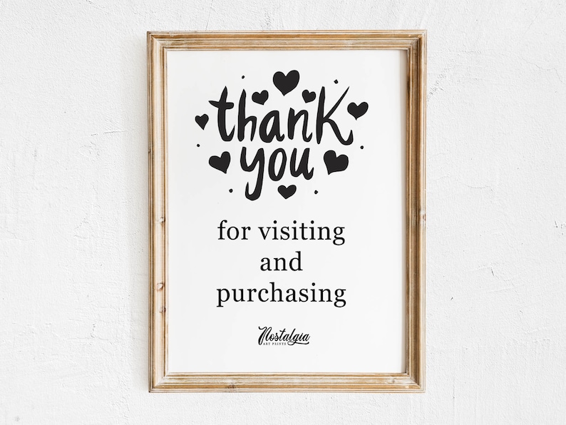 Może przedstawiać: Wydruk w ramie z tekstem "thank you" w czarnym piśmie odręcznym z sercami otaczającymi tekst. Tekst poniżej brzmi "for visiting and purchasing" ze słowem "Nostalgia" w mniejszej czcionce poniżej.