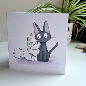 Cartão de felicitações com abraços de Jiji e Lily