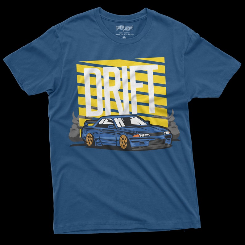 May include: A blue t-shirt with a yellow and white graphic of a car drifting with the word "DRIFT" above it.