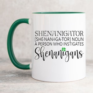 Shenanigator A Person Who Instigates Shenanigans Mug | Funny St Patrick&#39;s Day Mug | 11oz White Ceramic Coffee Cup | Green Handle & Interior