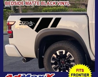May include: Matte black vinyl decal for a Nissan Frontier 2022 truck. The decal is on the side of the truck bed and says "4x4 Offroad".