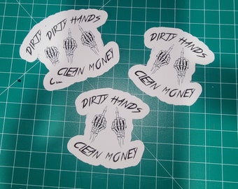 thumbnail interactive-video image 1 of Dirty Money Sticker - Die Cut Decal, 8.00" X 1.19", Graphic Theme, Rayd Workshop (Made In USA) 1 of 5