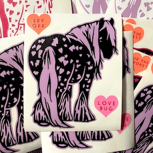 May include: A set of stickers featuring a black and white horse with a purple mane and tail. The stickers have hearts and the text "Love Bug" and "Eff Off".