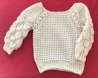 Beau pull au crochet pour bébé