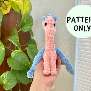 May include: Crochet pattern for a pink and blue dragon amigurumi toy. The pattern is for sale, not the finished toy.  PATTERN ONLY.