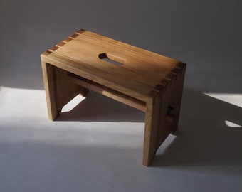 Simple, elegant, handcrafted step stool "rytschka" made of solid ash wood