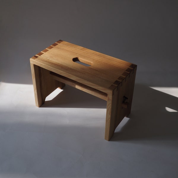Simple, elegant, handcrafted step stool "rytschka" made of solid ash wood