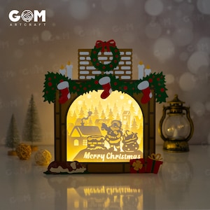 Christmas Fireplace Shadow Box SVG - Shadow Box Santa Claus - Adornos navideños DIY Lightbox - Plantilla de corte de papel de Navidad