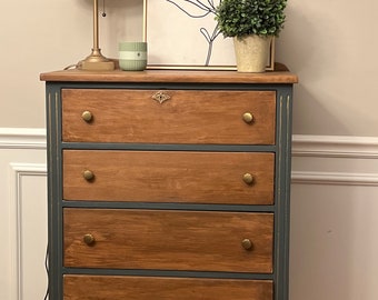 SOLD**This beautiful Antique dresser was made in  1920 by Globe Bosse World Furniture Co in Evansville Indiana. Tall chest of drawers,