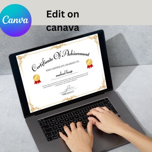 May include: A laptop computer displaying a certificate of achievement on the screen. The certificate is for "mahad haqfs" and has a gold seal with a red ribbon. The text "Edit on canava" is displayed in the top right corner of the screen.