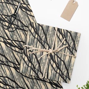 Gift wrap with design of weaving tree branches.