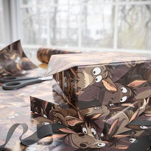 May include: A stack of brown gift wrap with a cartoon pattern of dogs with big eyes. The dogs are looking at the viewer.