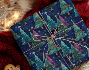 May include: A wrapped gift with a festive Christmas tree pattern on navy blue paper. The trees are teal, green, and pink with gold star accents. The gift is tied with gold ribbon, creating a holiday theme.