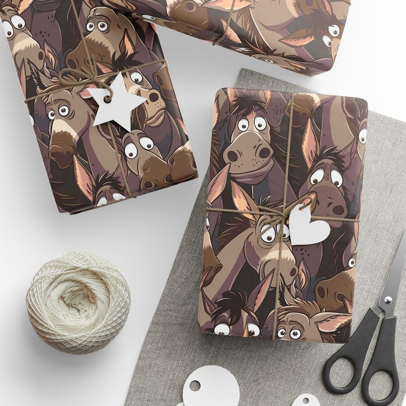 May include: Brown wrapping paper with a repeating pattern of cartoon donkeys with big eyes. The paper is wrapped around a gift box with a white star on top.