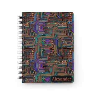 May include: A spiral bound notebook with a colorful circuit board design. The cover features a personalized name, "Alexander", in orange text.