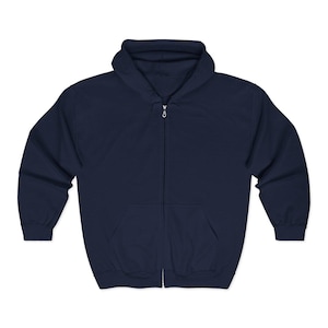 May include: A navy blue zip-up hoodie with a hood and a front pocket. The hoodie has a full-length zipper and long sleeves. The fabric appears to be a soft, comfortable material.