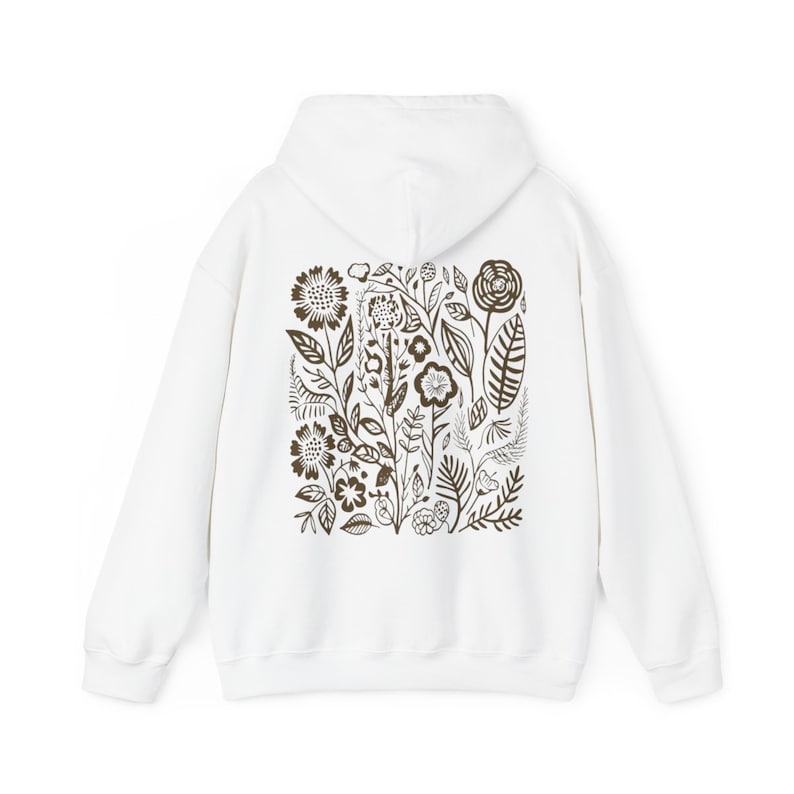 K&ouml;nnte beinhalten: Wei&szlig;er Kapuzenpullover mit braunem Blumendruck auf der R&uuml;ckseite.