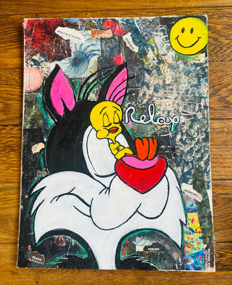 May include: A black and white cartoon cat with pink ears holding a red heart with the word "Relax" written in white. The background is a collage of colorful magazine clippings and a yellow smiley face.