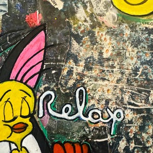 May include: A yellow cartoon bird with closed eyes and a pink beak is painted on a black background. The bird is wearing a white shirt and has a pink wing. The background is a collage of different textures and patterns, including flowers, a smiley face, and the word "Relax".