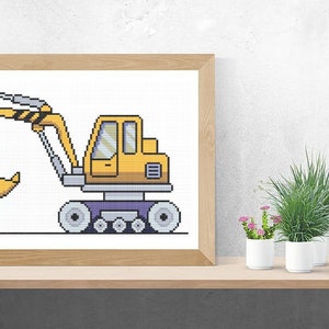 Peut inclure: Illustration pixelisée d'une pelleteuse jaune et violette avec un bras rayé noir et jaune.