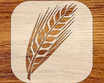 May include: A wooden coaster with a wheat stalk design. The wheat stalk is etched in a darker brown color against a light beige background. The coaster has rounded corners and is square-shaped.